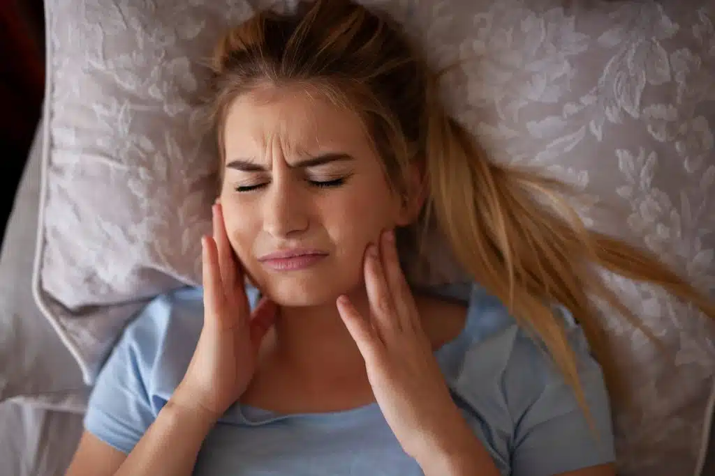 Jaw pain after waking up or sleeping